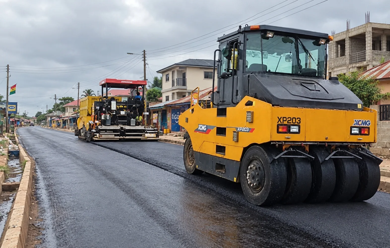 Road roller working on paved surface